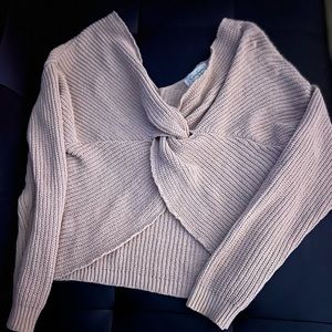 Long sleeve shirt. Knot is the front side of the shirt.